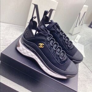 CHANEL Black and Gold Men's Sneakers